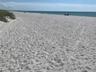 Spectacular Beach at the Bay Isles Beach Club. White sugary sand and Azure blue seas soak up the afternoon sun.