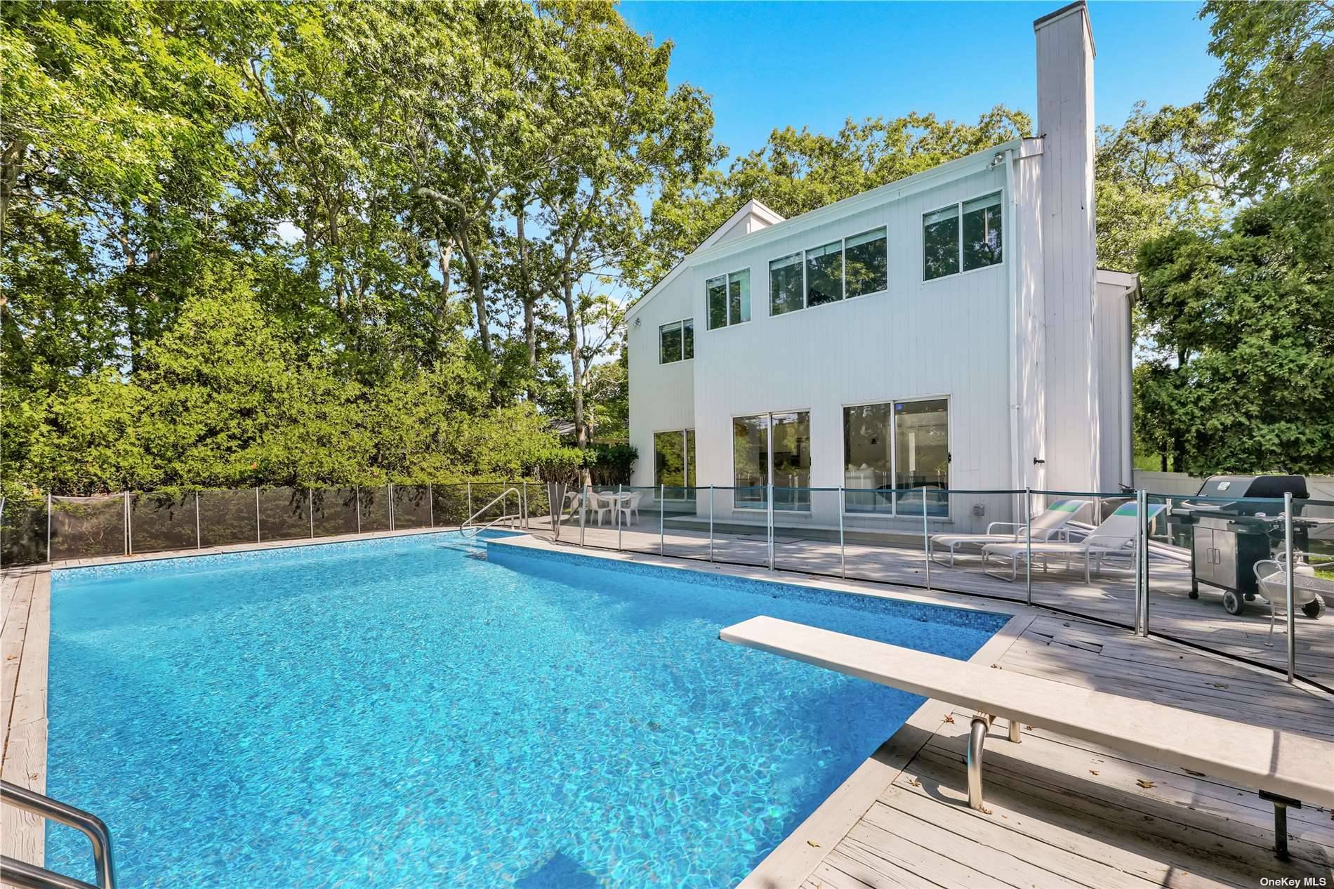 Rest. Relax. Recharge. Do it all at this Westhampton abode !