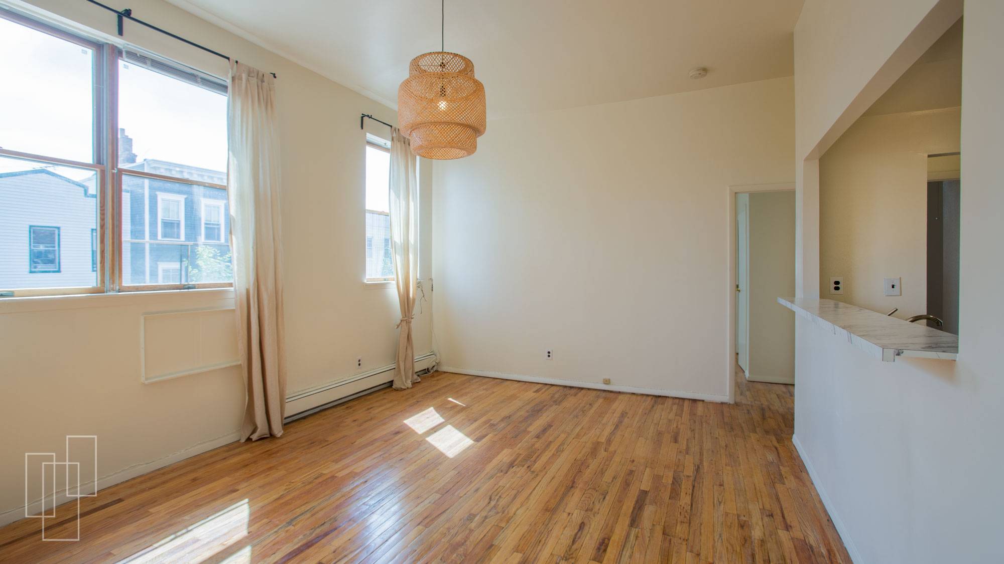 This remarkably quiet 2BR apartment boasts 12 foot ceilings and is flooded with natural light.