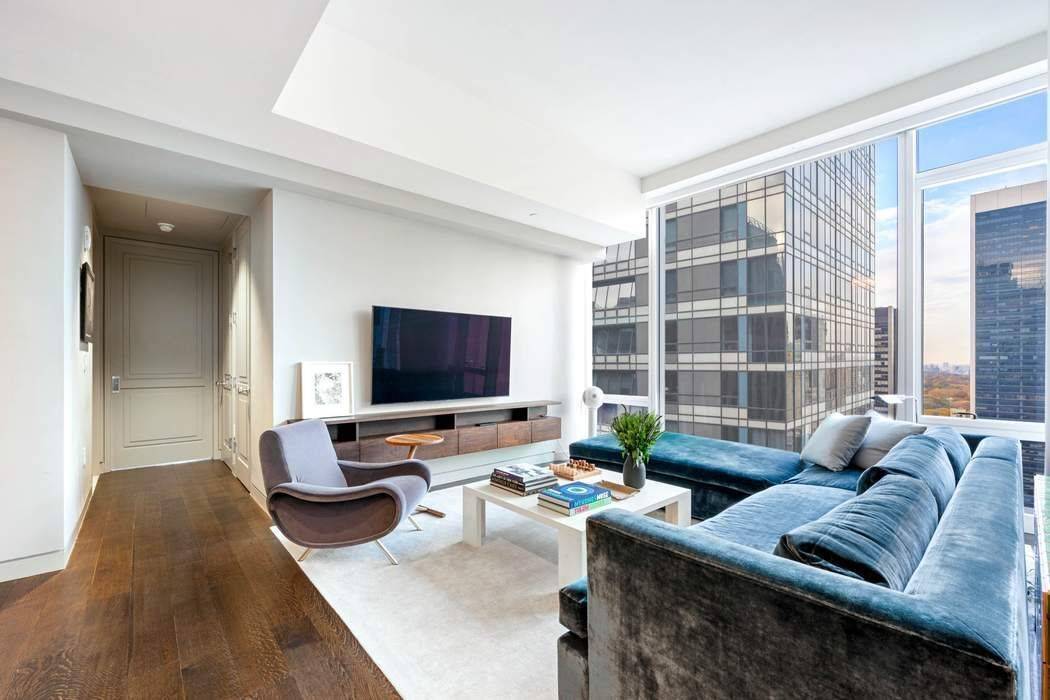 Tony Ingrao's design imparts refined elegance and warmth to this 31st floor, 2 bedroom, 2.