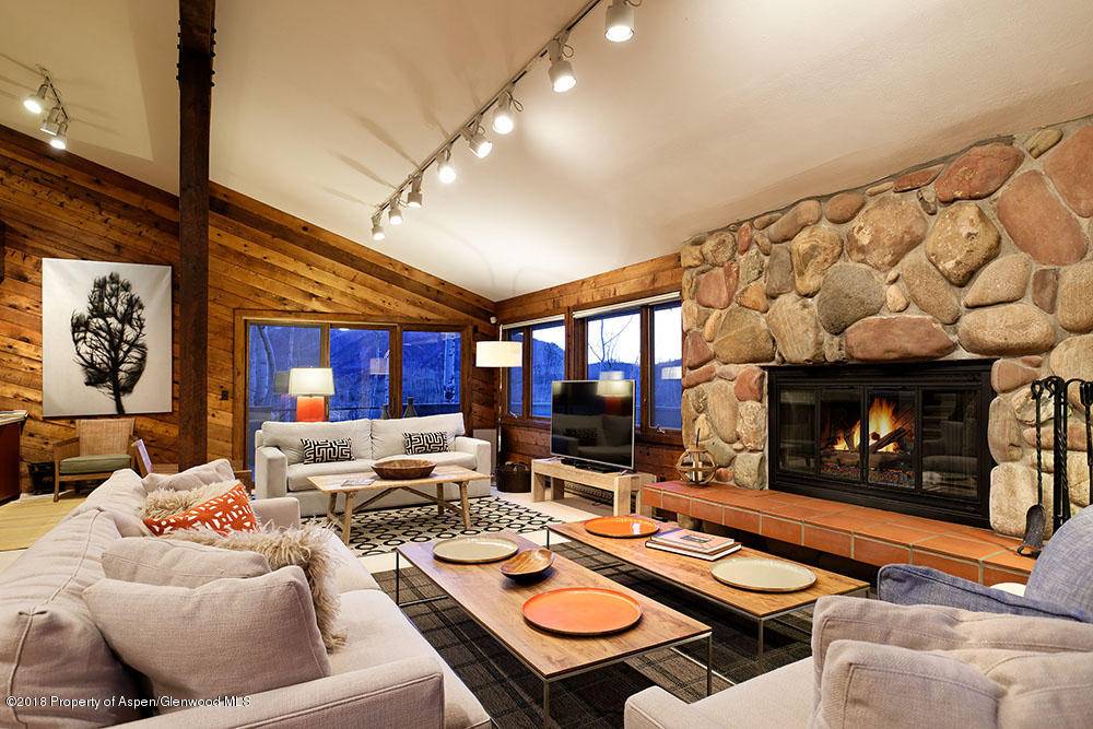 This unique location on the slope of Guggenheim Hill, with gorgeous wide open east to west views of Snowmass Village is secluded and nestled among the Aspens groves, providing a ...