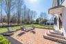 View of patio / terrace with a garage