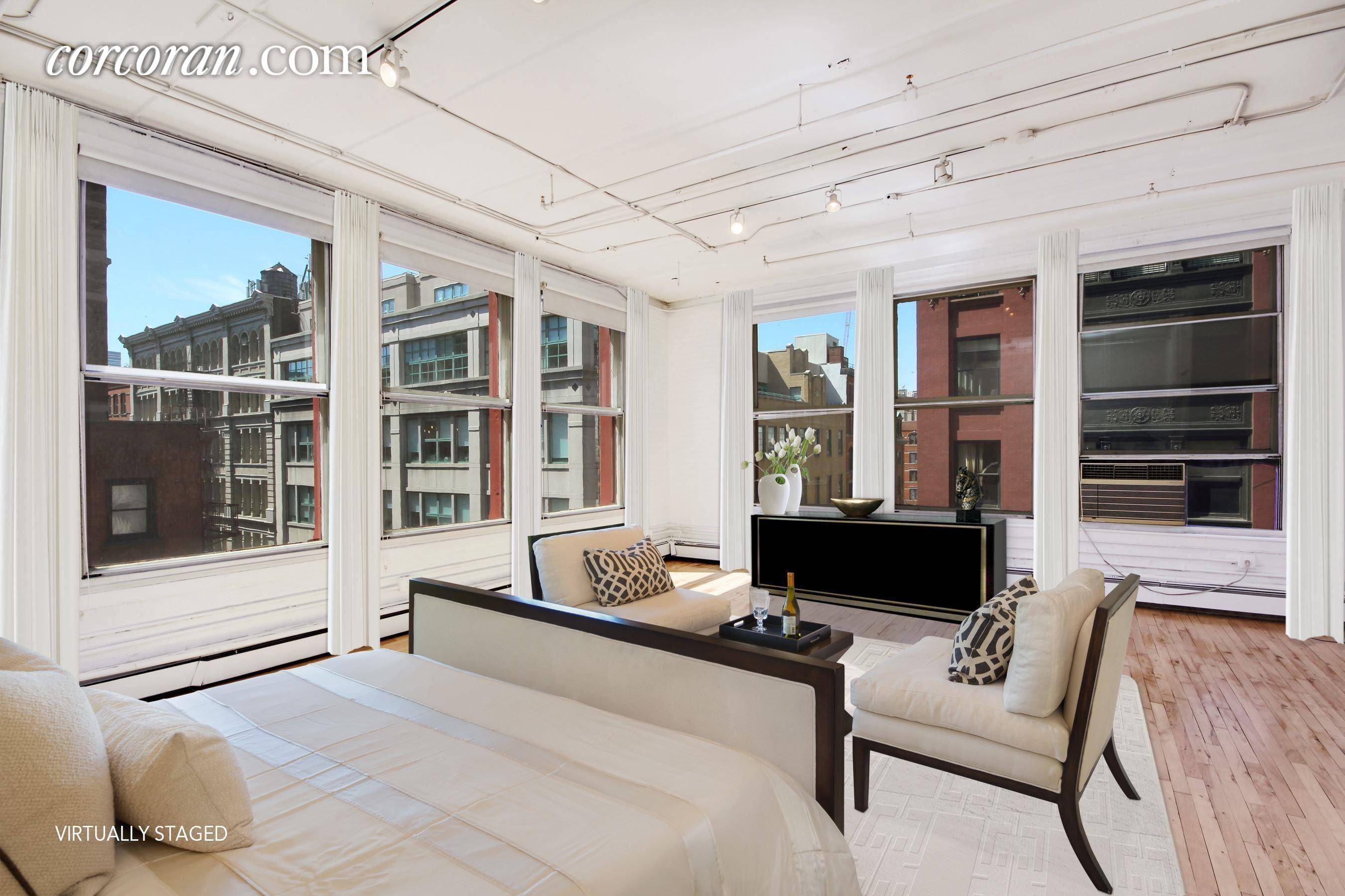 132 Wooster Street Apartment 4 is a classic full floor SoHo loft with breathtaking natural light.