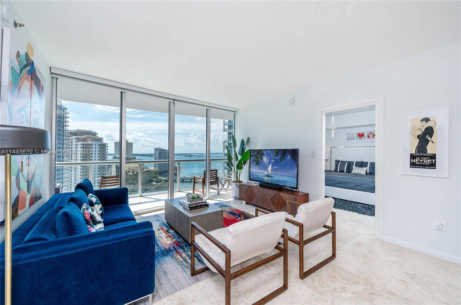 Absolutely stunning ! This fully furnished and turnkey 2 bedroom, 2 bathroom unit with an additional den at ICON BRICKELL is a true gem.