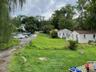 View of yard featuring view of scattered trees