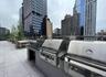 View of patio featuring a city view, outdoor dining space, and area for grilling