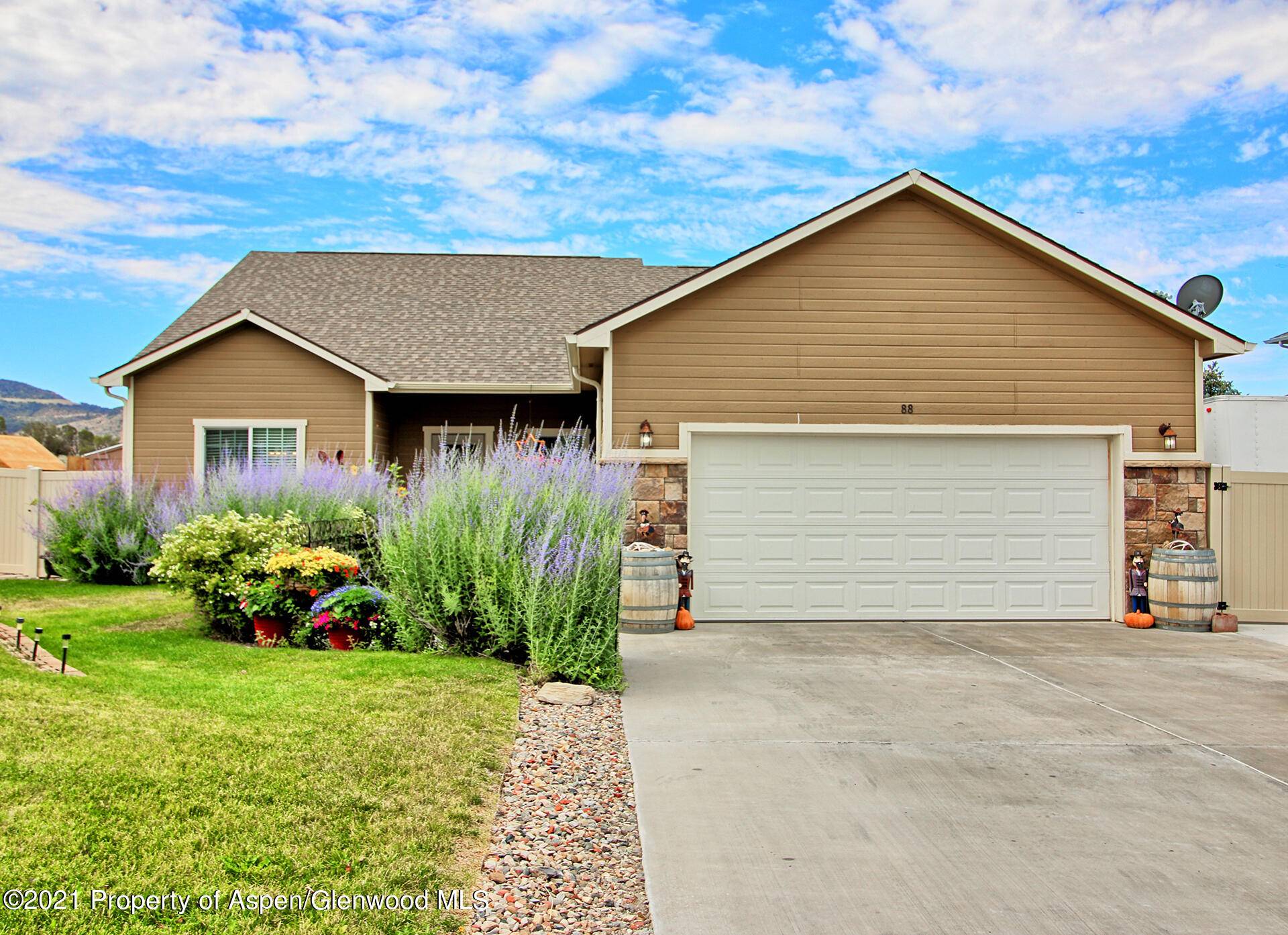 VIEWS VIEWS VIEWS... This gorgeous Ranch style home w rich finishes, including pristine Maple hardwood floors in common areas, is nestled in a beautifully maintained Battlement Mesa Subdivision w stunning ...