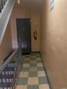 Staircase featuring tile patterned floors