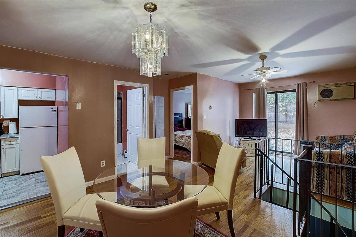 Extremely rare 1 bedroom duplex condo with private backyard in prime location of Corona, Queens.