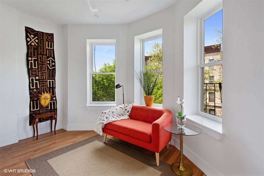North Crown Heights tastefully renovated limestone building featuring high end rental units.