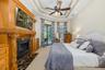 Primary Bedroom with custom gas fireplace