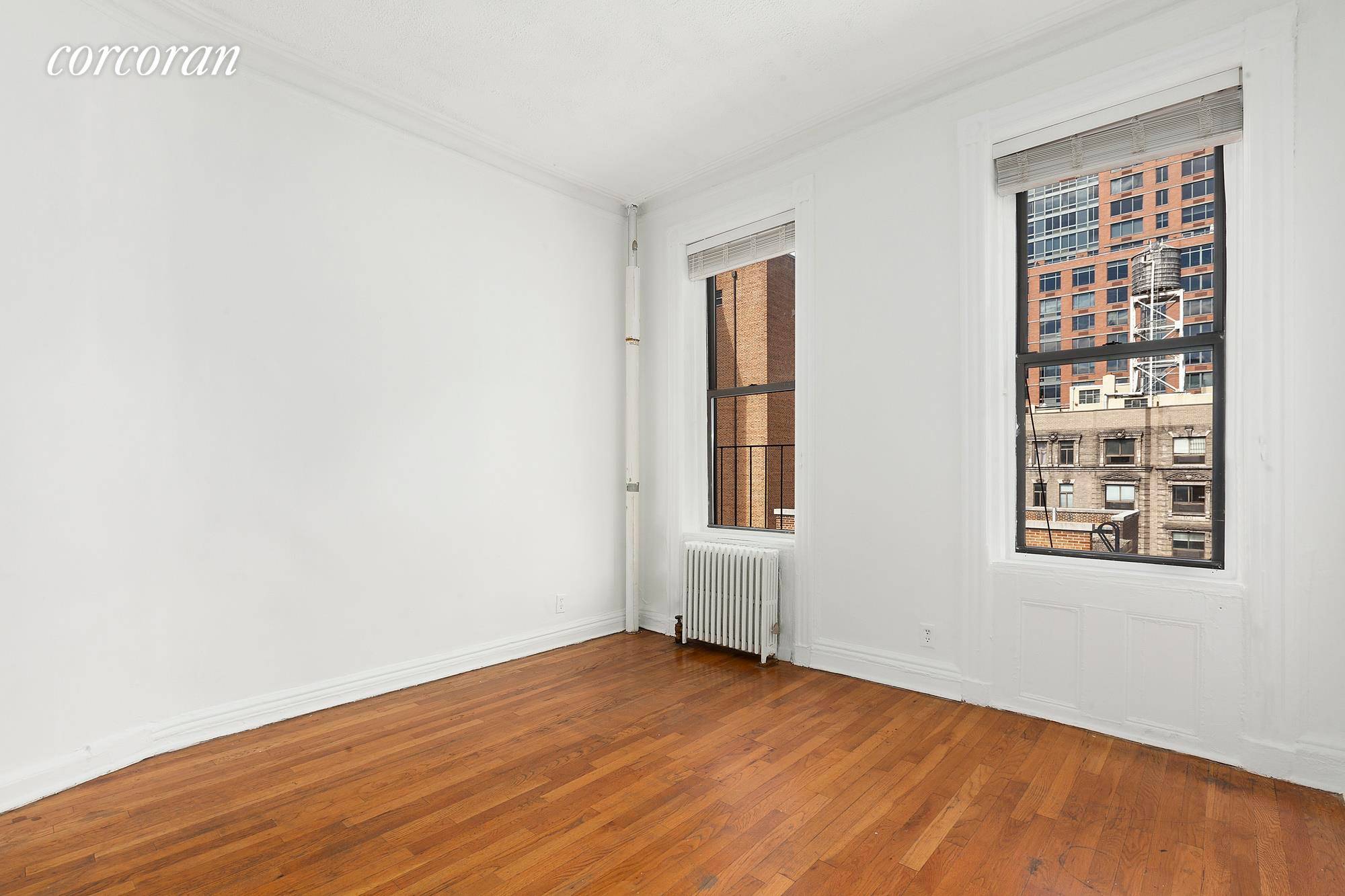 NO FEE This spacious two bedroom or one bedroom with a large living room located in Murray Hill is available for immediate occupancy.