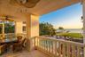 Grand-scale living with seamless indoor-outdoor flow. Limestone stairs take you directly to the resort style pool from the kitchen area.
