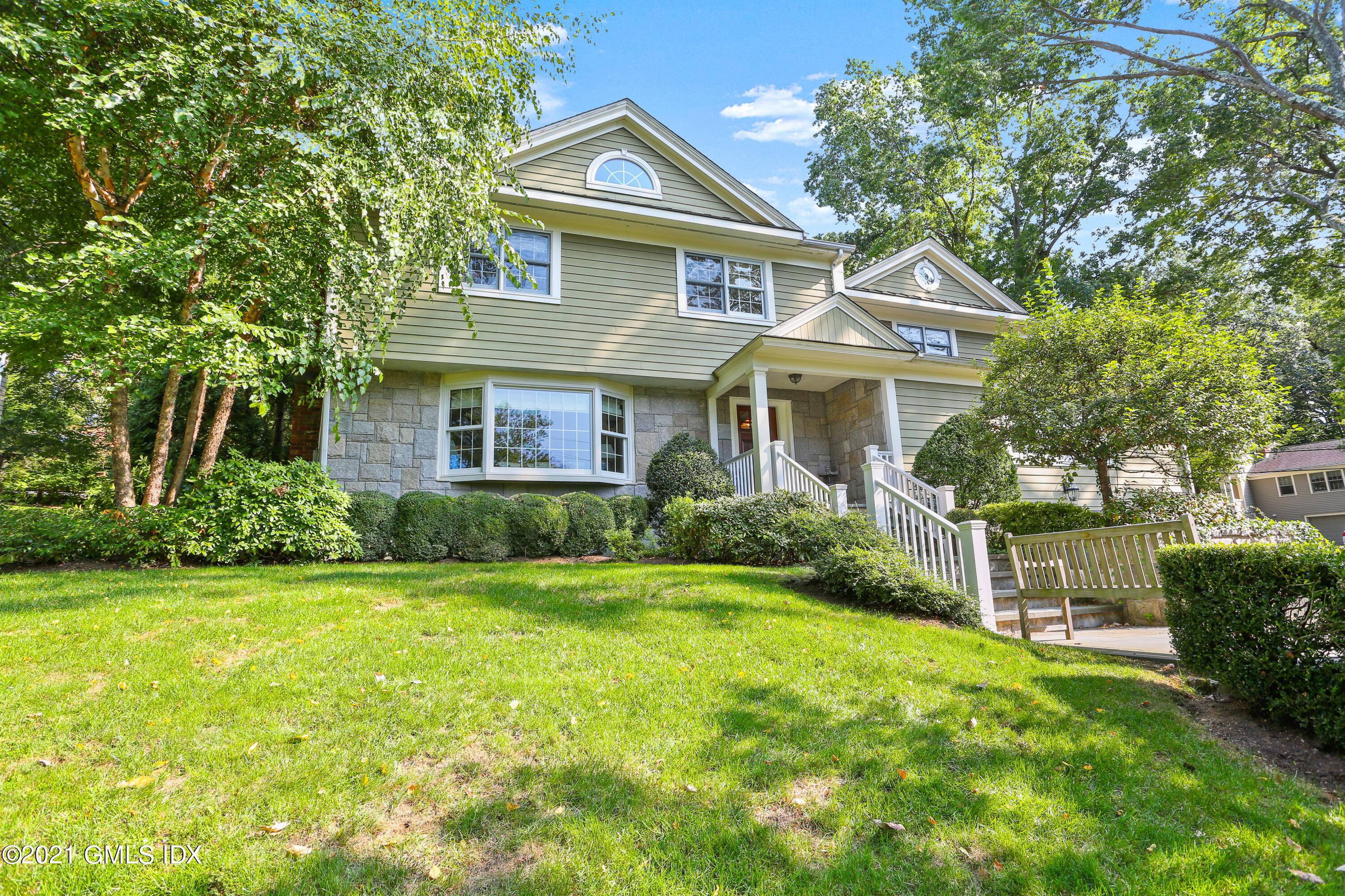 Move right into this light filled colonial in a sought after private neighborhood minutes to all of the Old Greenwich town amenities !
