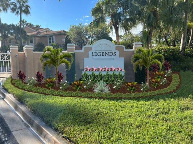 Live the Legends ! Highly desirable first floor condo on the 8th tee box of the Champion Golf Course !