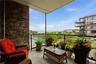 Private balcony off living room featuring beautiful river views and peaceful outdoor retreat.