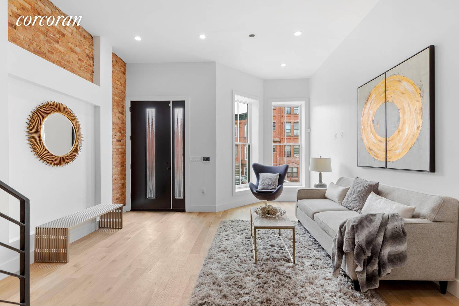 Welcome to 369 Herkimer Street ; a meticulously gut renovated four story, two family townhouse nestled within the heartbeat of Bedford Stuyvesant and just off the border of Crown Heights.