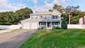 Welcome to this stately Victorian with a LARGE driveway and many custom built in features to enjoy!