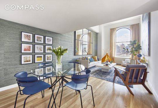 Spacious and bright two level loft with a large open living area and soaring ceilings with southern exposure in the most in demand luxury mid rise in the West Village.