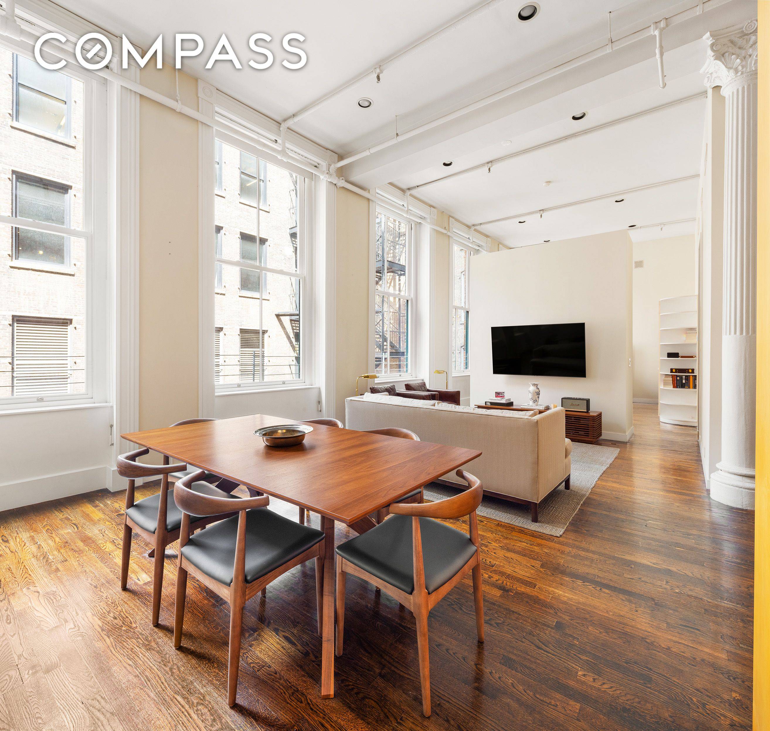 At the center of Soho s most coveted street, this beautiful home combines classic open loft living with modern conveniences.
