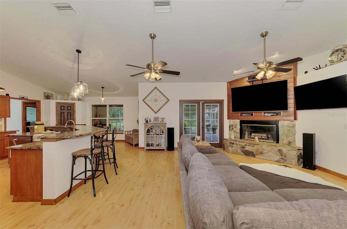 French doors lead to the super-sized screened lanai