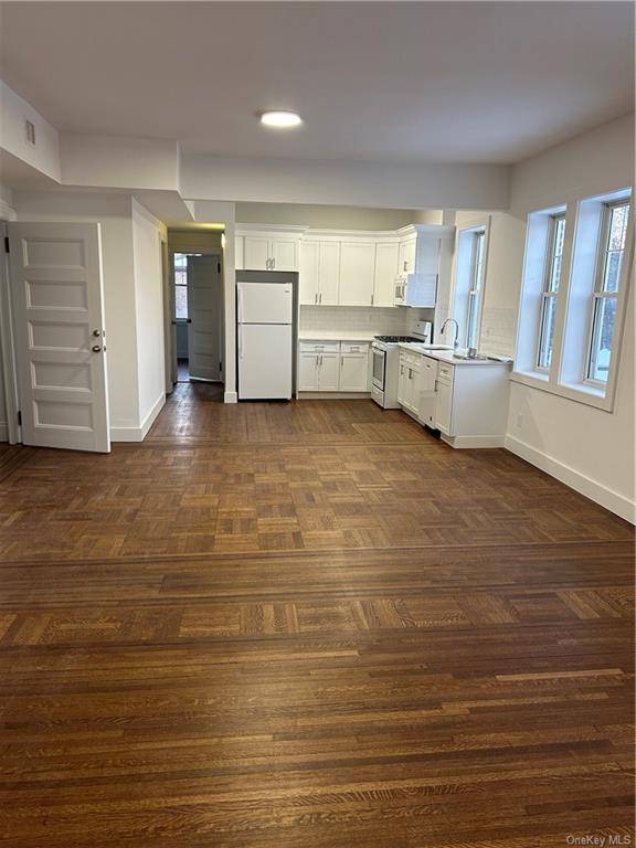 Move right in to this completely renovated, spacious three bedroom, one bath unit in a private home in the Bronx Manor area on the border of Pelham Manor.