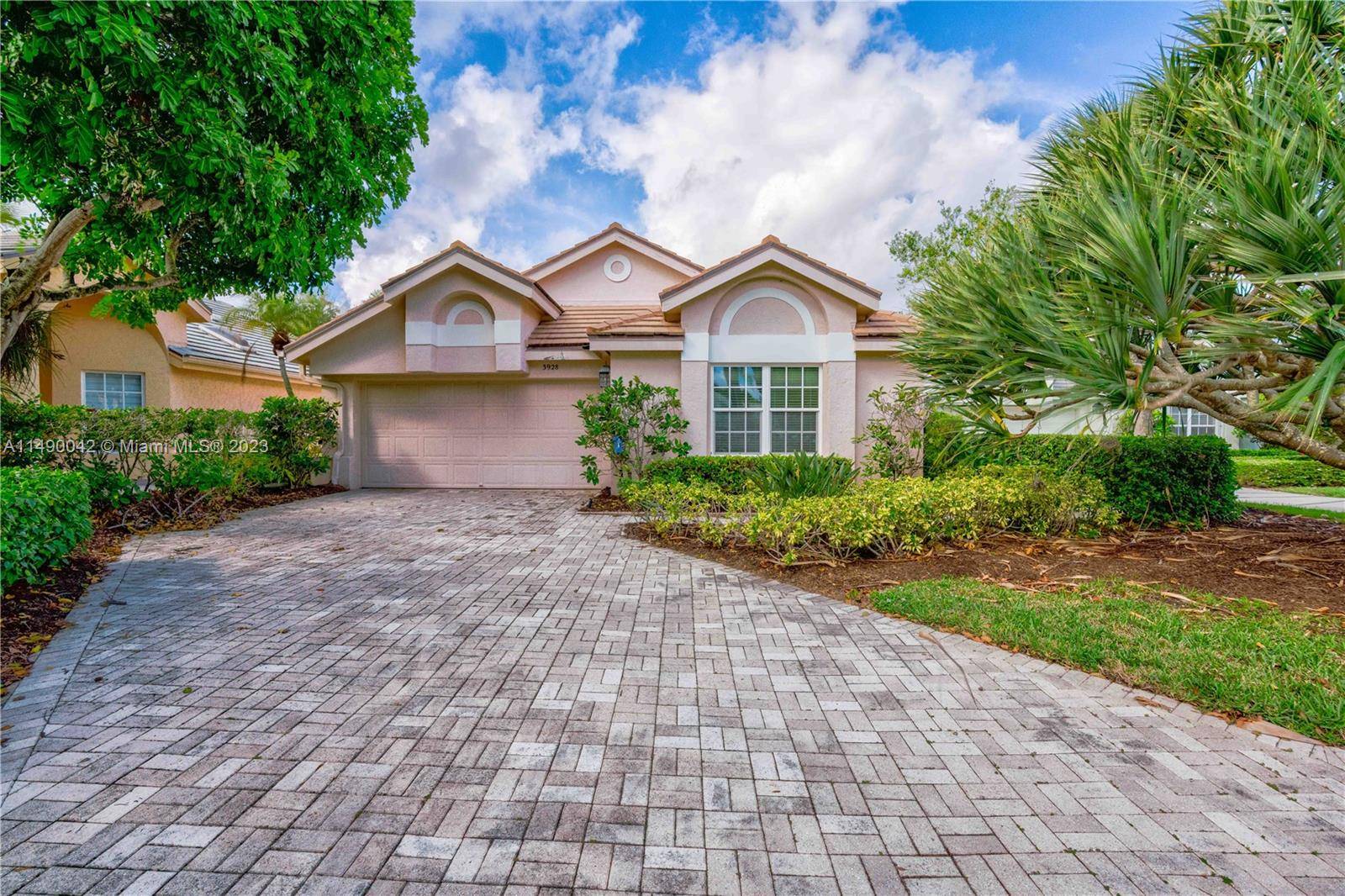 Welcome to this charming home nestled within a serene golf community.