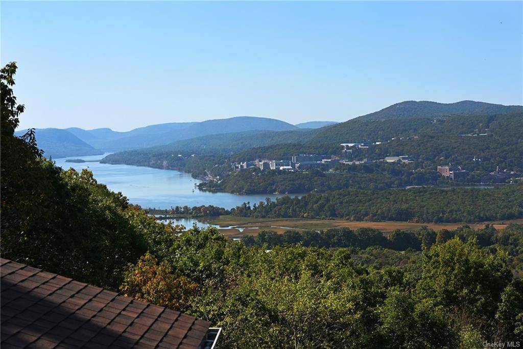 Spectacular Hudson River views dominate all as you experiance this expansive custom contemporary offers over 5, 000 square feet of elegant living on 4 plus acres.