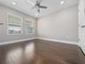 3rd bedroom with views overlooking the park and the lake