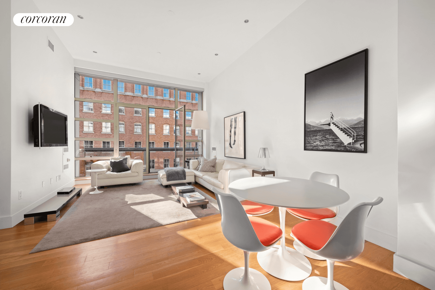 This two bedroom, two bathroom Tribeca loft shines with chic contemporary interiors and glorious natural light in a boutique condominium nestled at the intersection of Tribeca, Hudson Square and SoHo.