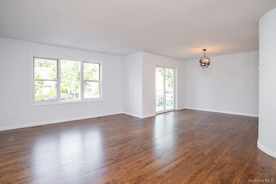 Light Filled Living Room/Dining Room with access to outdoor deck