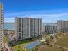 Landmark Tower One features a pool, spa, tennis & pickleball courts, a swing set and a boardwalk to the sugar sand beach!