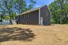 A private side entrance leads to a bright, finished lower level, offering flexible space that's ideal for quests, extended living, or future planning.