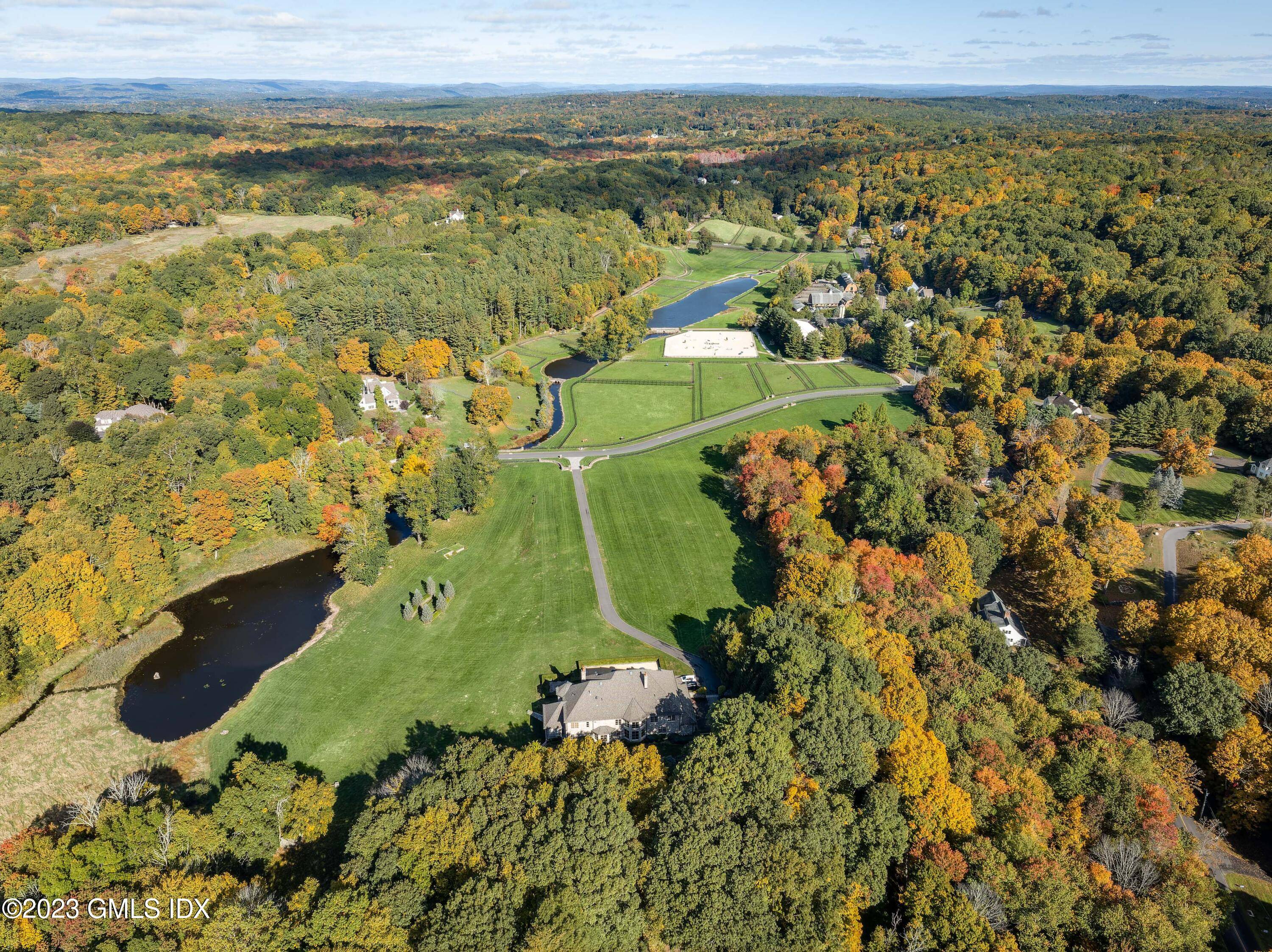 Red Gate Farm A rare opportunity to acquire a TURN KEY equestrian property in Fairfield County with a main house set high overlooking the 54 bucolic acres and the Aspetuck ...