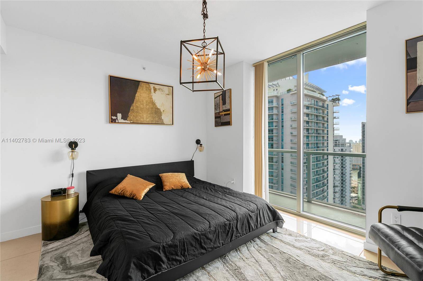 Experience this stylish, fully furnished 2 bed 2 bath modern penthouse corner unit with breathtaking views of the city from its wraparound balcony and partial bay views.