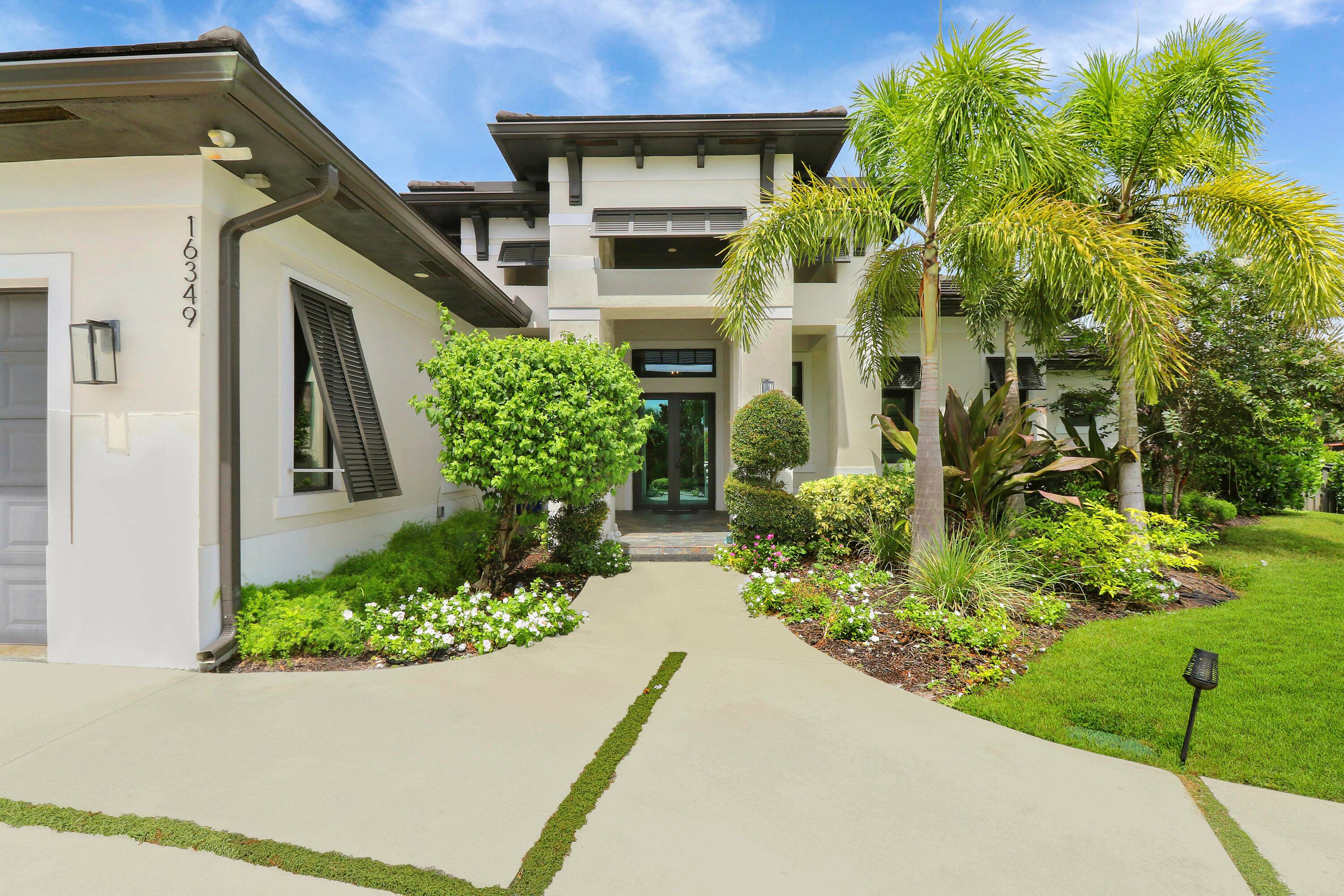 Live in luxury and serene beauty as you explore all that South Florida has to offer from this incredible property in Palm Beach Country Estates !
