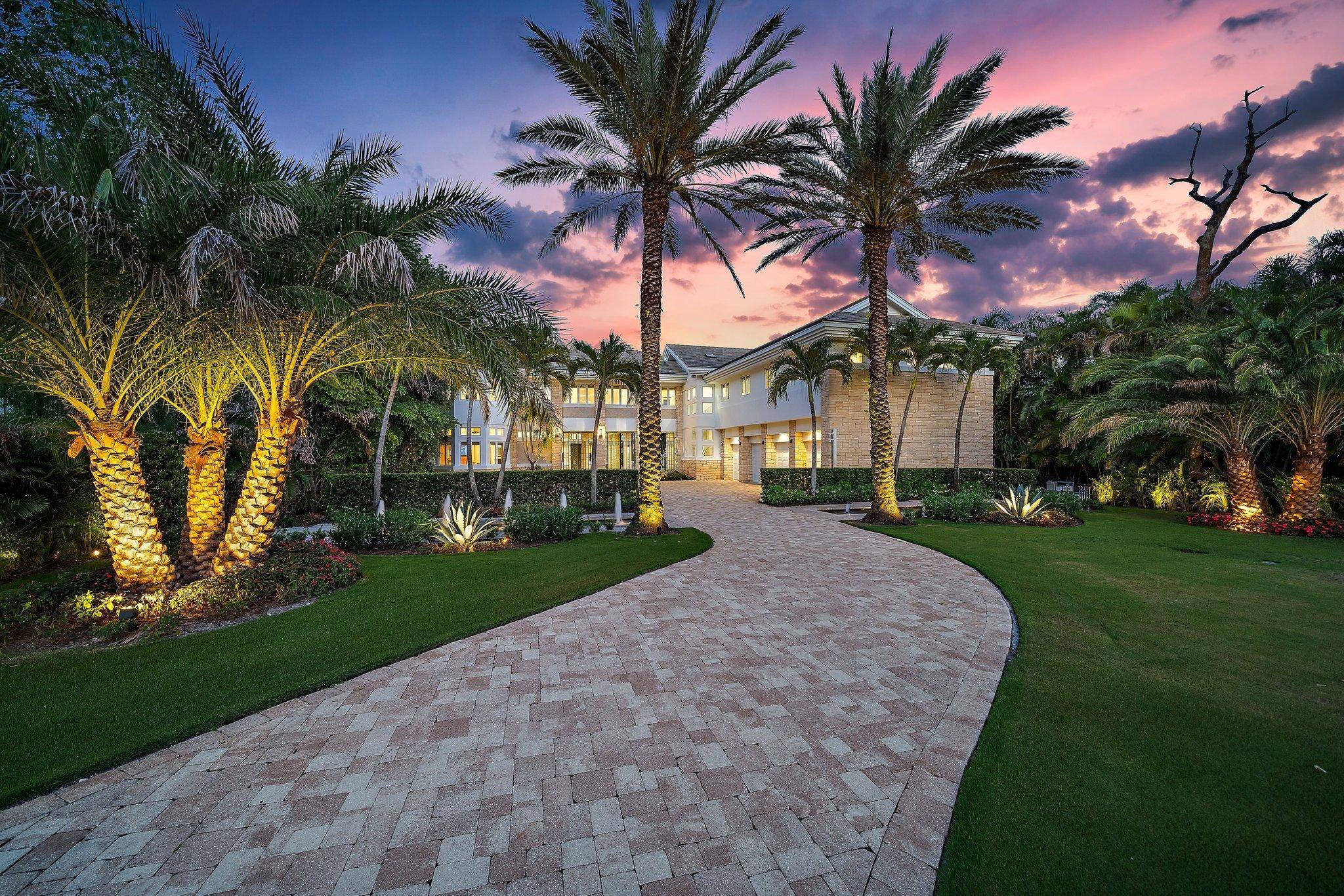 Stunning palatial modern Intracoastal home with over 9, 300 interior SF and 106' of direct deepwater frontage !