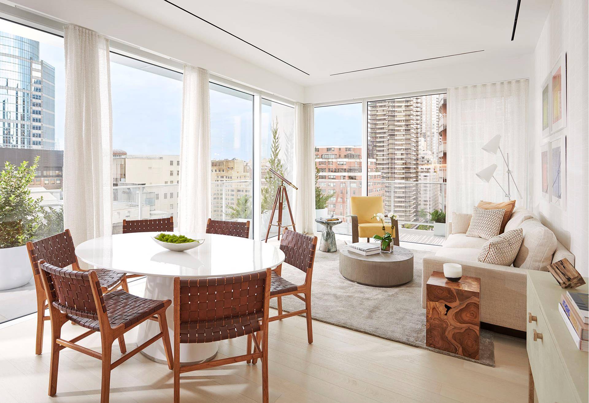 This spacious, corner 1, 416 square foot two bedroom, two and a half bath residence features a deep wraparound terrace overlooking Central Park, and western views of the Midtown skyline.