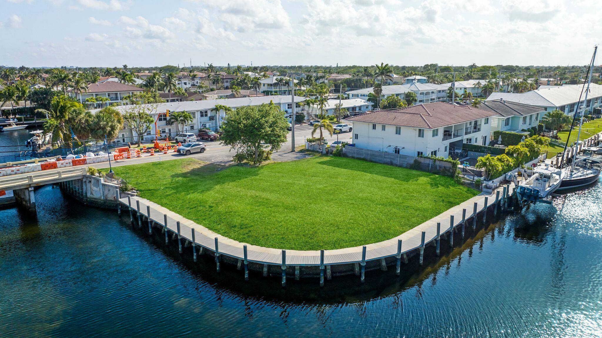 Seize an unparalleled development opportunity in Lighthouse Point with this prime point lot offering 180 degree intracoastal views and easy ocean access.