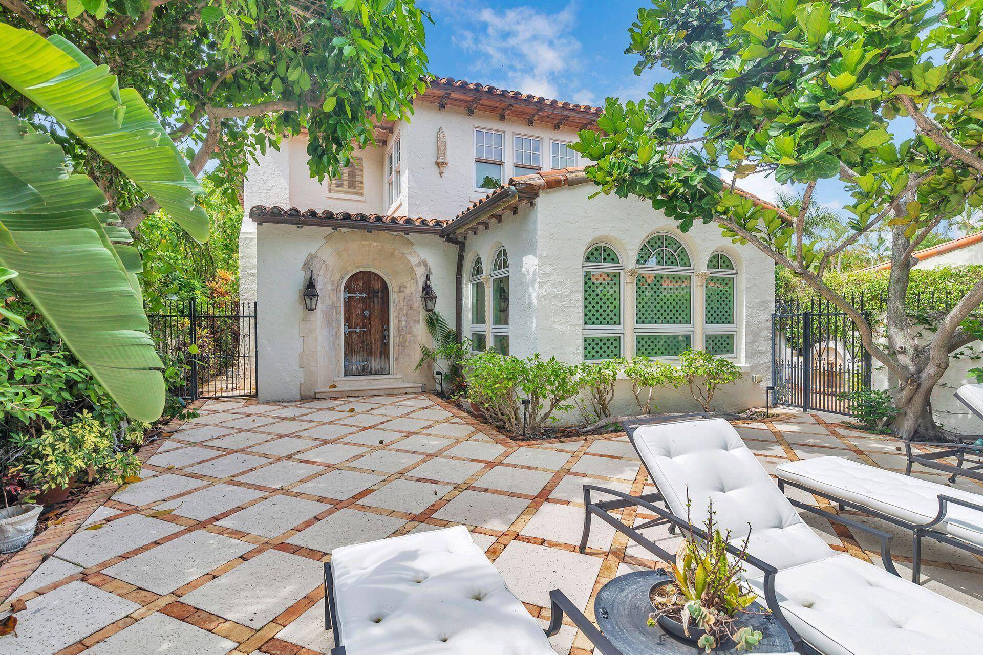 Authentic El Cid Spanish Courtyard Home with stunning architectural details throughout.