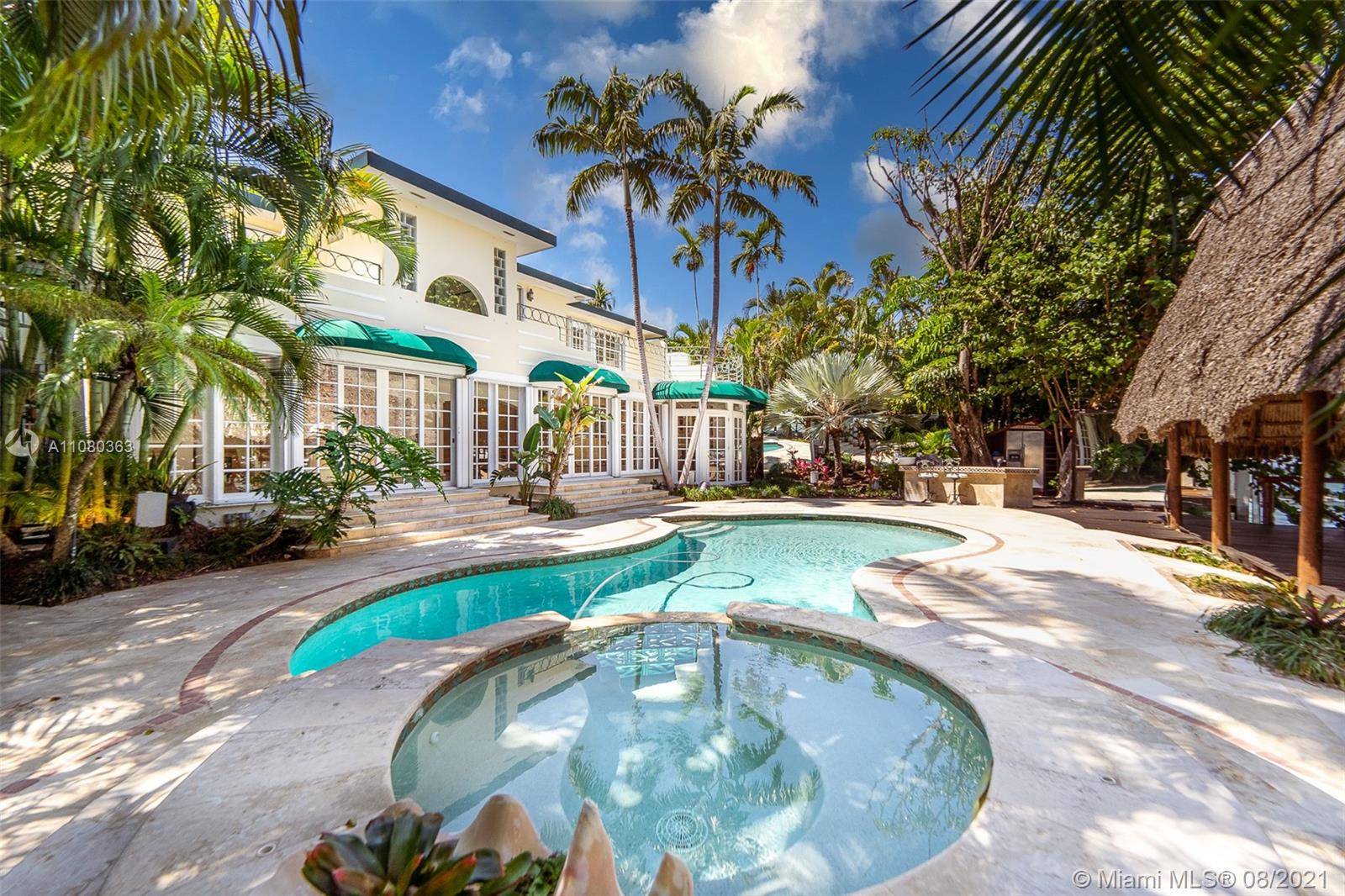 Live out your Miami dream at this waterfront property.
