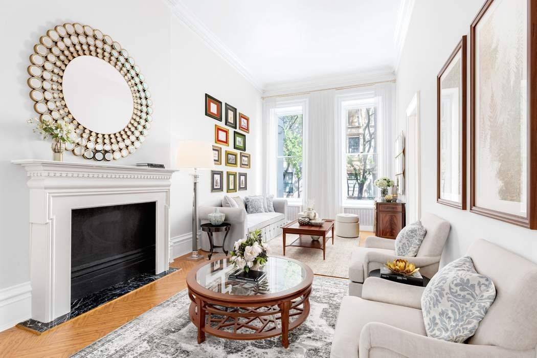 Newly renovated duplex townhouse apartment with two private terraces in a coveted location just off Park Avenue on 62nd Street.