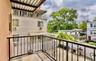 Private balcony with wrought iron railing