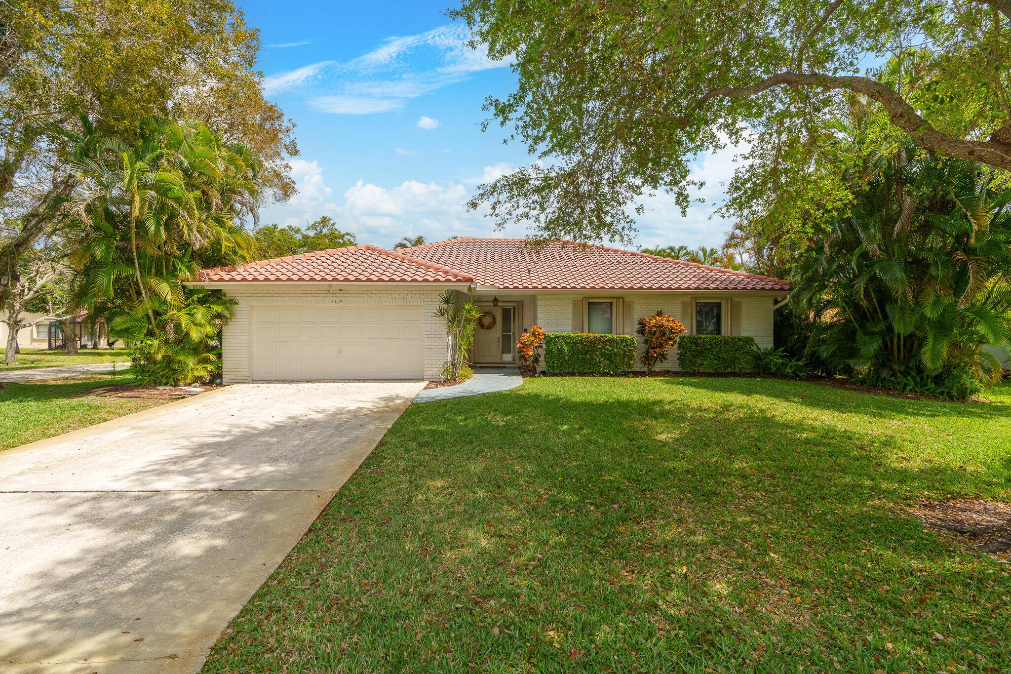Charming Coral Springs Single Family pool home nestled on a corner lot in The Crossings.