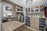 Custom built in walk in closet w/ tons of drawers - great storage
