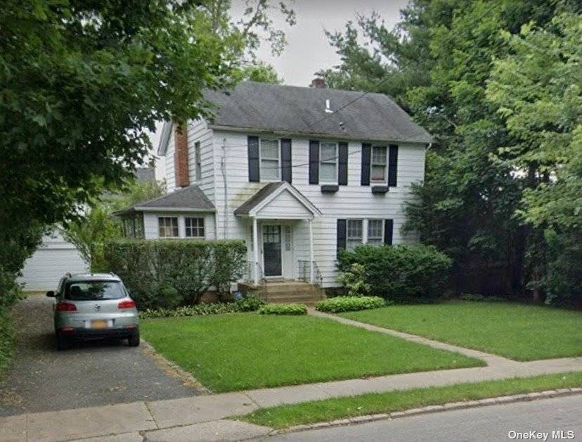 This property boasts a prime location on a great street, conveniently positioned near the LIRR, just half a mile from both the L.