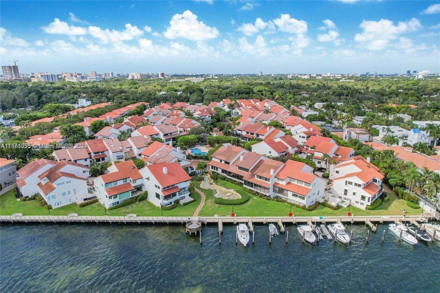 On highly desired South Bayshore Drive, L'Hermitage is a private 24hr guarded Waterfront Community in Coconut Grove of 75 tri level luxury residences.