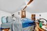 Bedroom with vaulted ceiling