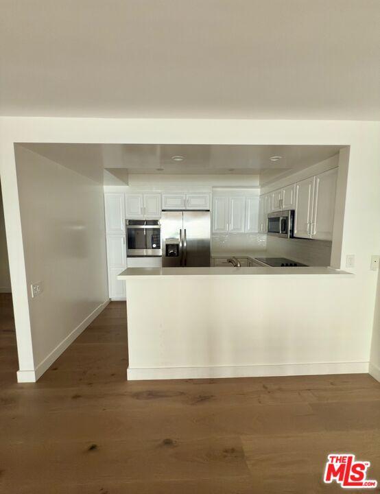 View of kitchen from dining ar