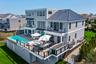 Rear view of property with a patio area, a balcony, and outdoor dining area